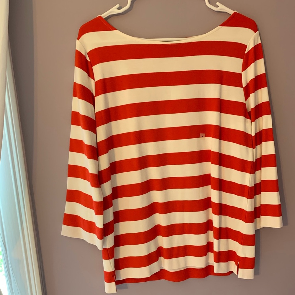 orange and white striped blouse.
